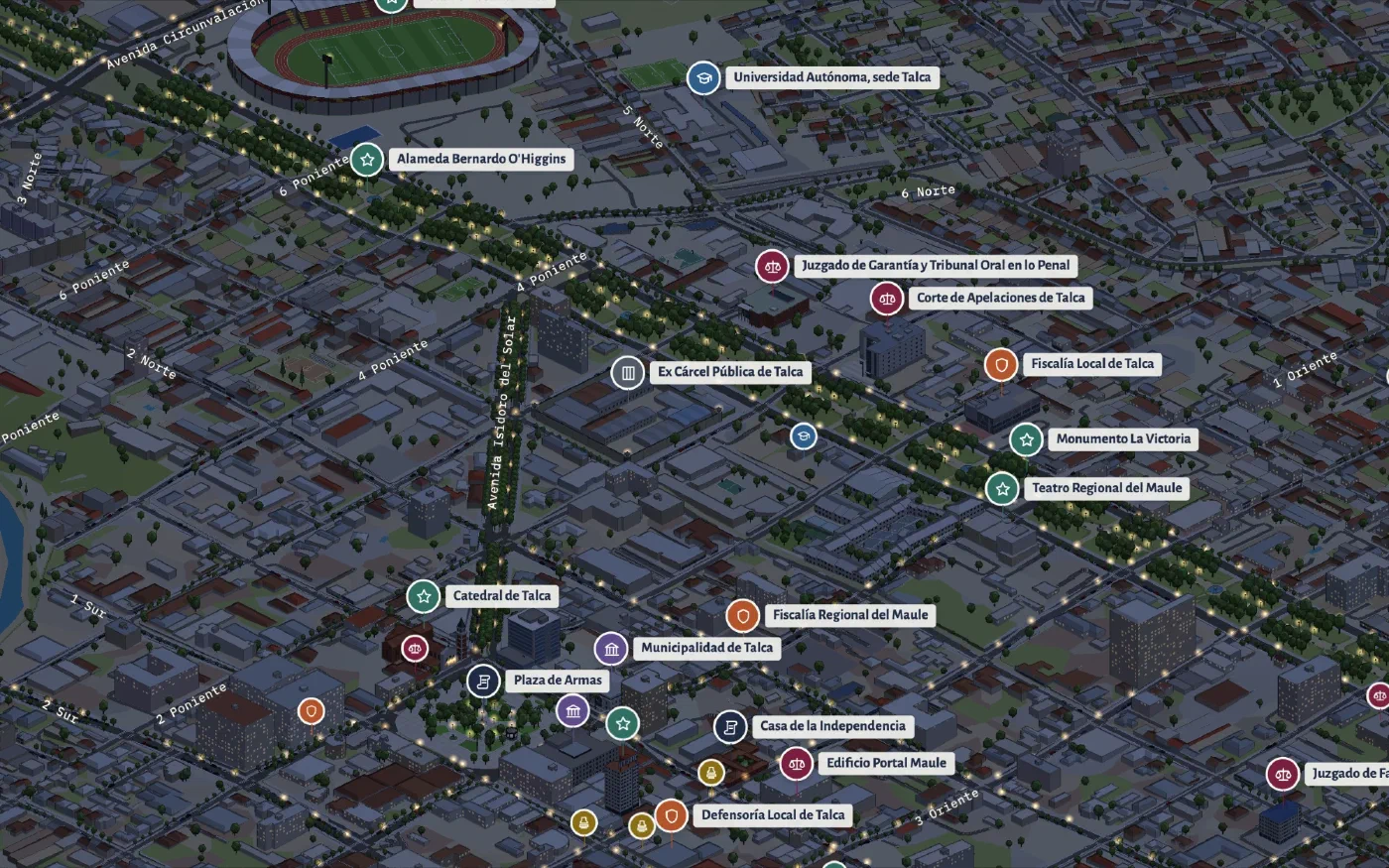 El barrio cívico de Talca en modo noche, con las luces de la Alameda y los marcadores de la Corte, el Juzgado de Garantía y las fiscalías